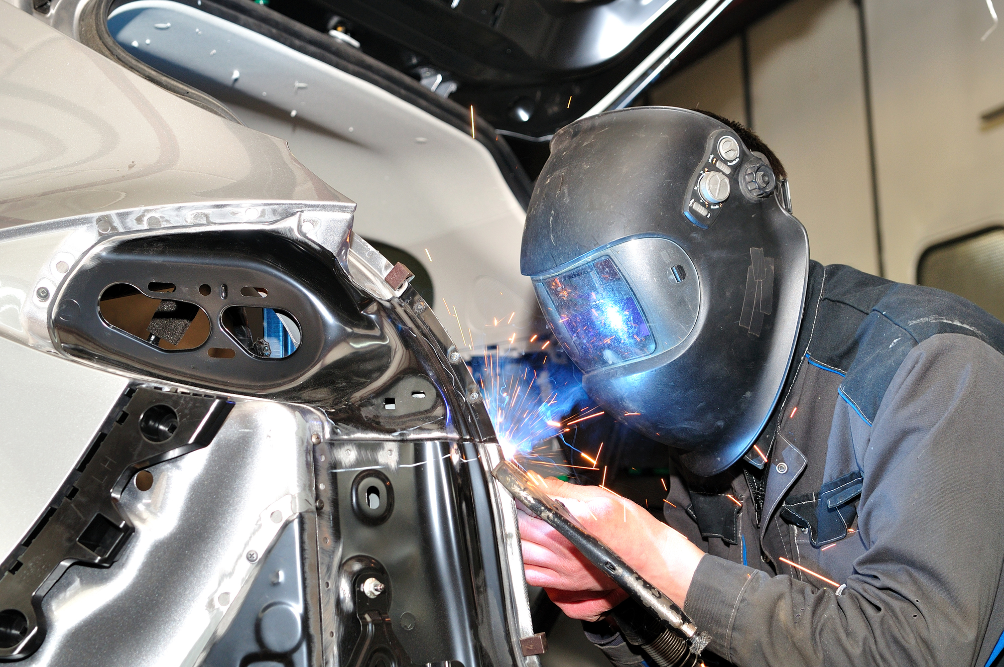 Proffesional car body repair, welding panels.